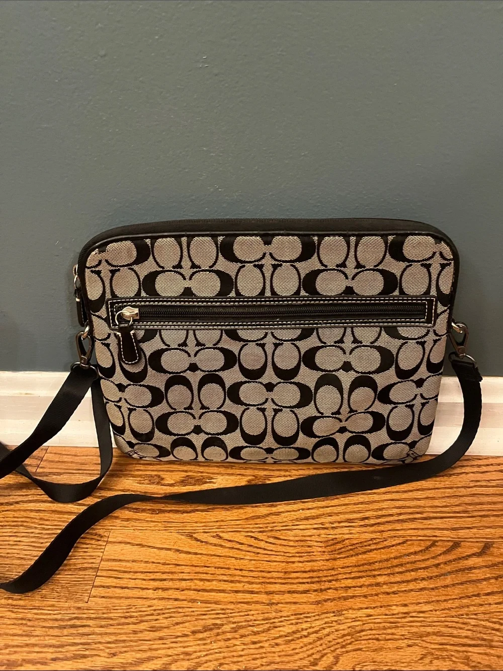 Coach signature monogram padded tablet case with a black stripe